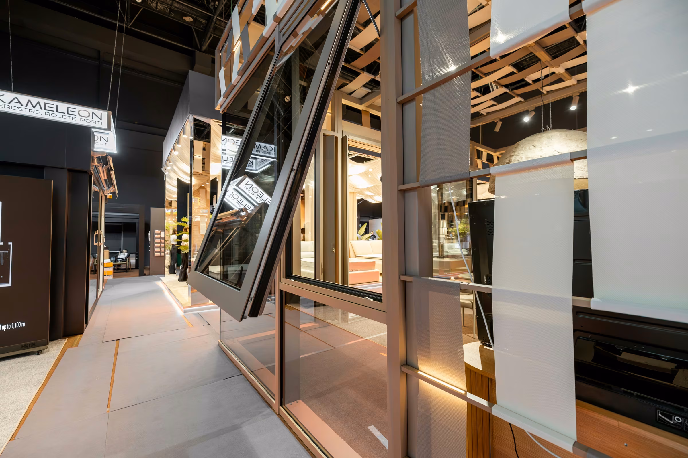 Side view of an outward-opening window beside the stand's glazed surfaces.